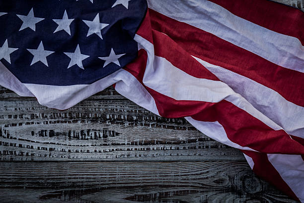 istock American flag on wood background 485348584