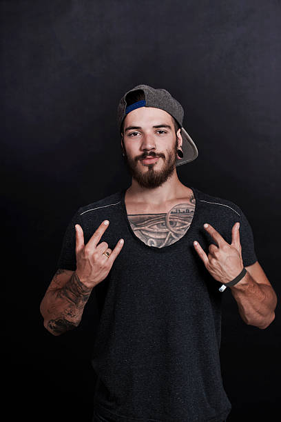 istock Serious young urban man with tattoo 485349212