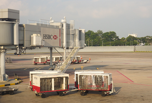 Bangkok, Thailand - July 2, 2015: Some vehicles running inside Don Muang International Airport. Don Muang is a regional commuter flight hub in Bangkok, Thailand.