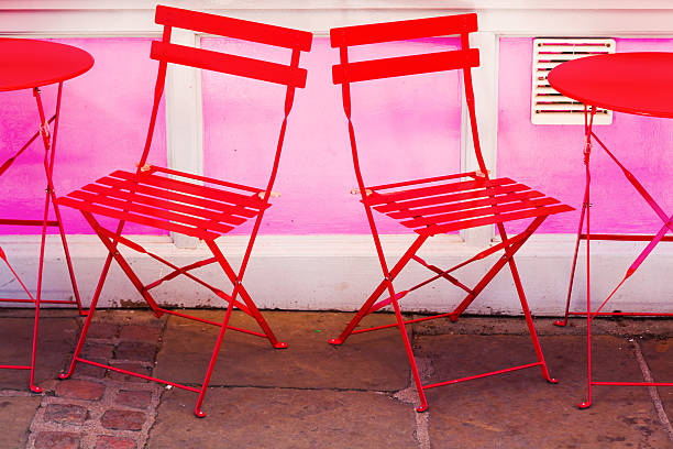 istock red cafe house chairs and tables 485352248
