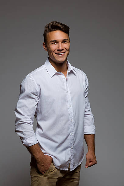 istock Smiling Male Model In White Shirt 485355642