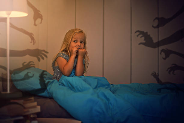 istock Afraid of the monsters lurking in the shadows 485355658
