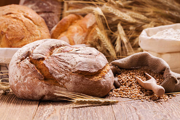 istock Composition of fresh bread, cereals and grains. 485355992