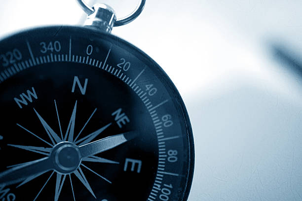istock compass in vintage style on mulberry paper texture 485356540