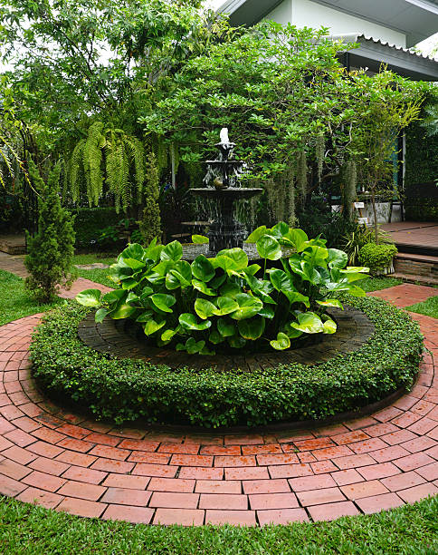 istock water fountain with red brick walkway 485358638