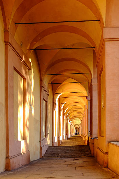 San Luca Archway in Bologna lighted by the red light of sunset
