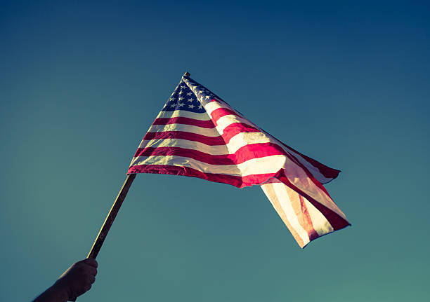 istock American flag with stars and stripes hold 485364206