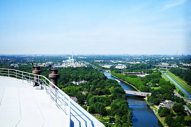 Panoramic view of Rhine-Herne-Canal and western Ruhrgebiet from Gasometer in Oberhausen. Close to canal is destructor.