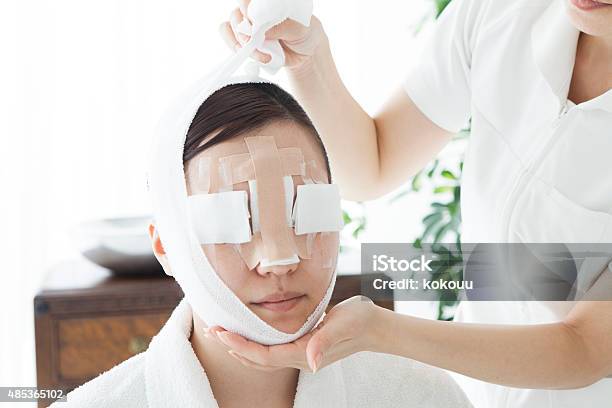 Nurse To Bandage The Patients Face Stock Photo - Download Image Now - 2015, Adult, Aging Process