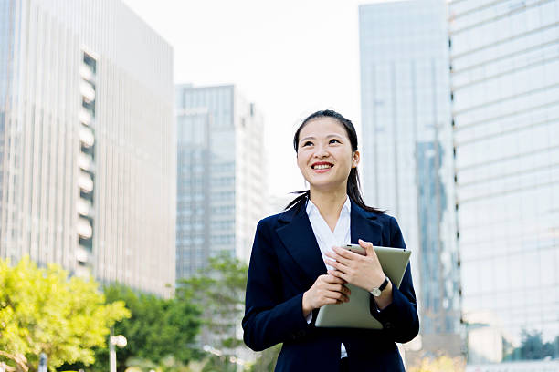 istock Asian businesswoman using digital tablet 485366256