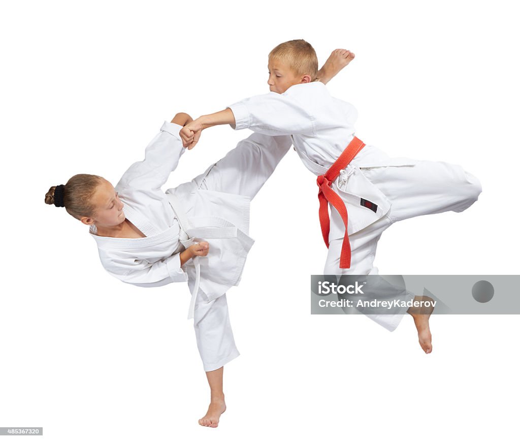Girl and boy in karategi beats blows kartegi 2015 Stock Photo