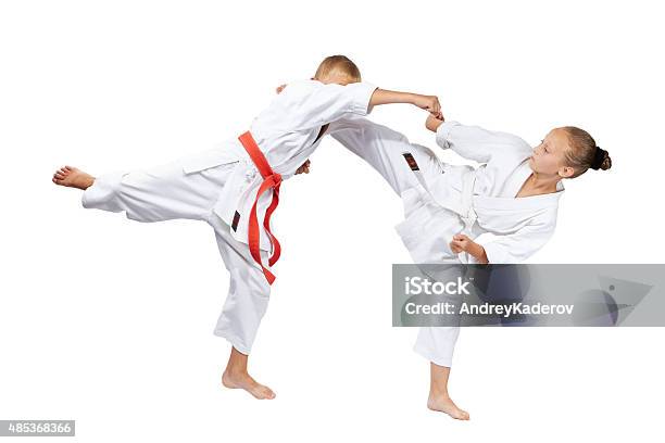 Blows Karate Are Beating Sportsmens In Karategi Stock Photo - Download Image Now - 2015, Activity, Belt