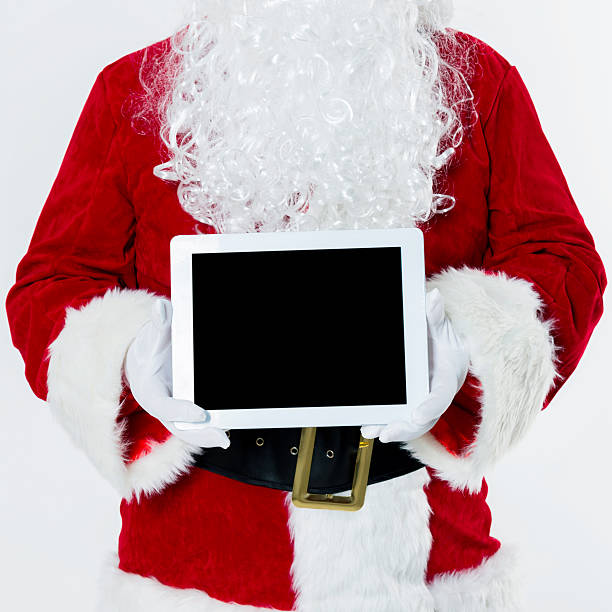 istock Santa claus showing digital tablet 485368608