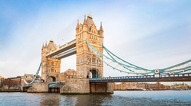 London Tower Bridge, River Thames UK Panorama of famous Tower Bridge in the sunlight and River Thames in London at day. London, United Kingdom. drawbridge photos stock pictures, royalty-free photos & images