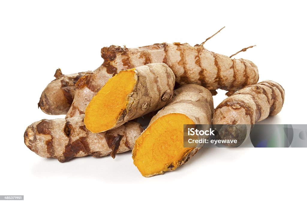 Turmeric roots isolated heap of turmeric rhizomes isolated on white background Turmeric Stock Photo