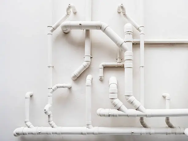 Photo of Pipeline Plumbing system on white wall