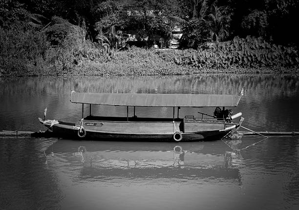 istock retro and grain image of long-tailed boat at mae-ping river 485372052