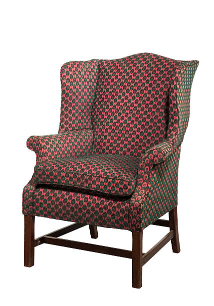 istock Large wing chair upholstered in red old antique isolated 485372870