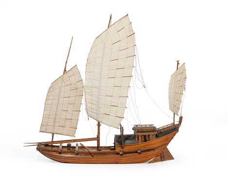 Junk boat model Chinese or Indian old vintage isolated on white background with clipping path