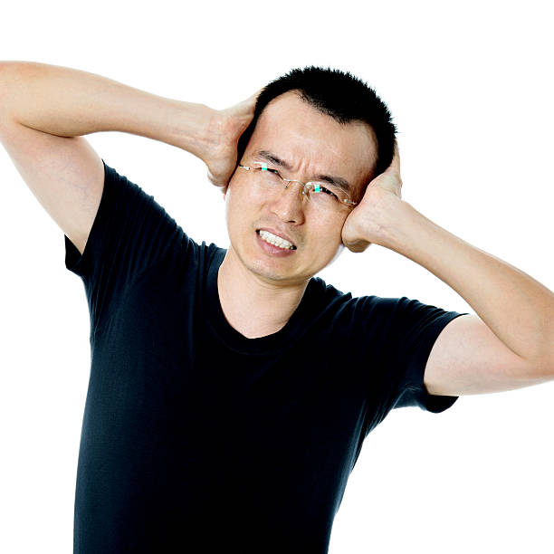 istock Young asian man suffering from headache 485374160