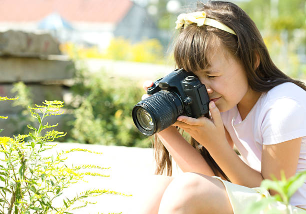 istock Girl taking picture on natural 485375332