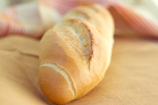 istock White bread loaf near the napkins 485375657