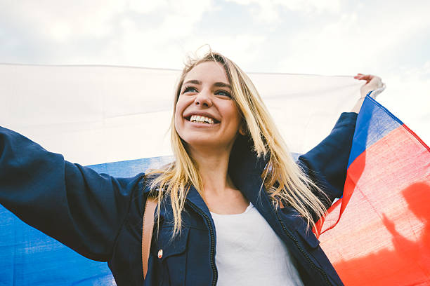 istock Cheering Woman Under Russian Flag 485376960