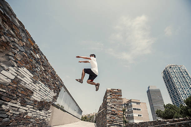 istock Man jumping practicing parkourin Barcelona Spain 485377500