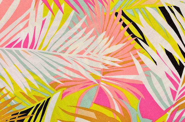 Colorful tropical leaves pattern on fabric.
