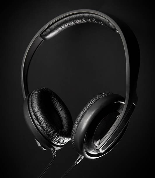 istock Black Headphones on a black background 485381556