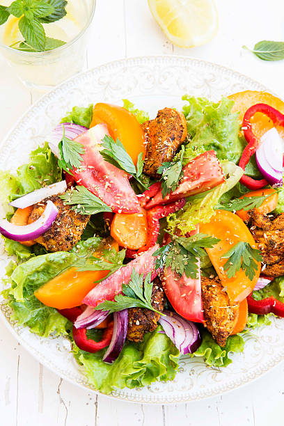 istock Fresh Salad Meal with Tomatoes,Lettuce,Peppers, Onion and Grille 485384148