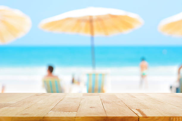 Table top on blurred background of people at the beach
