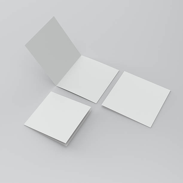 Square blank leaflets or brochures three-wings square blank brochures isolated on light background unfolded stock pictures, royalty-free photos & images
