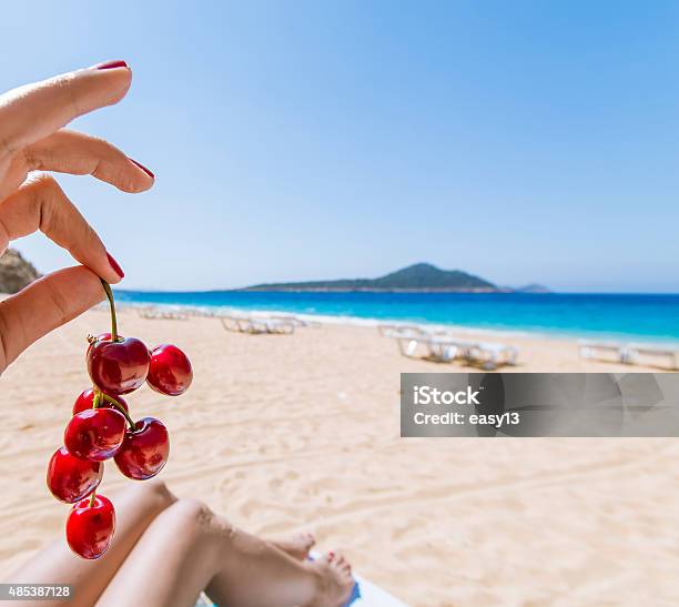 Cherries On The Sea Shore Stock Photo - Download Image Now - 2015, Antalya Province, Beach