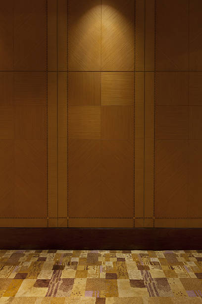 istock Wooden Wall and Carpet with Lighting from Above. 485387636