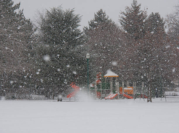 Playground in Snow Storm stock photo