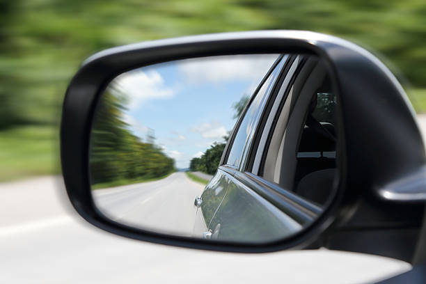 istock image of street from the sideview mirror 485389144