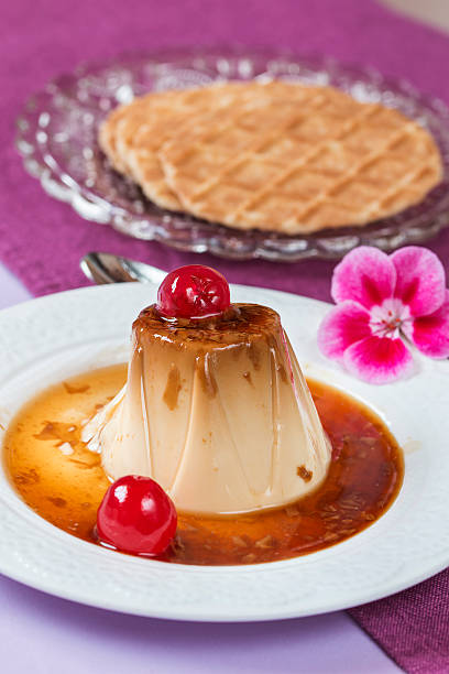 istock Panna cotta with cheries, caramel and wafer 485393488
