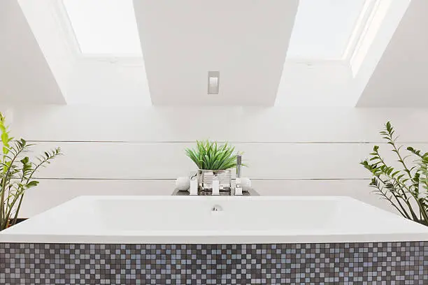 Photo of Huge bathtub in modern bathroom