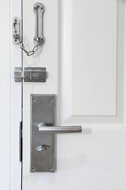 istock Modern style metal locked with chain and door knob. 485403238