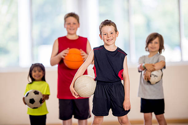 istock Little Boy with Volleyball 485404312
