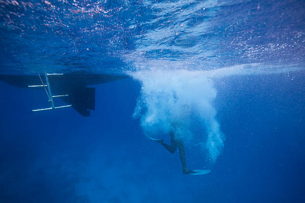 istock Scuba diver jumping into water from a dive boat 485404688