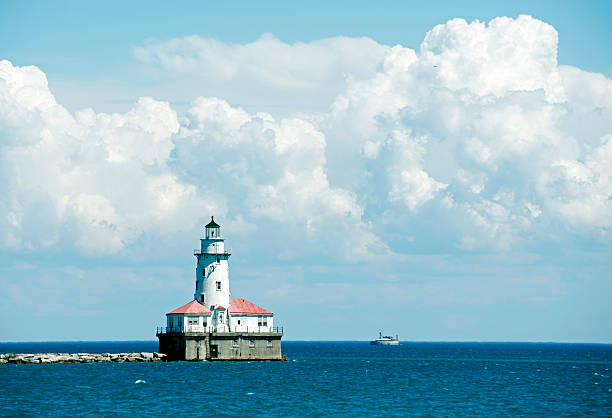 istock Lighthouse and water crib at harbor in Chicago IL 485405214