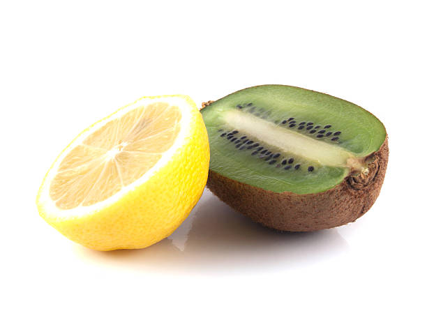 istock Isolated sliced half of kiwi and lemon. 485406927