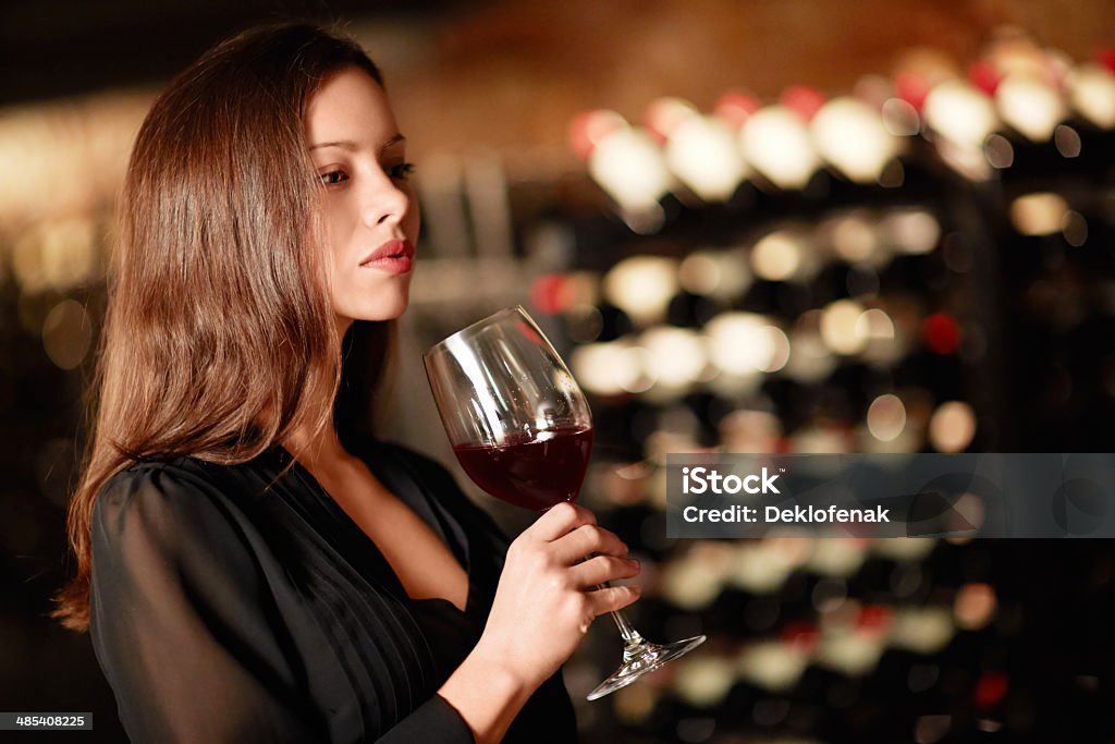 Beautiful woman Beautiful girl in the wine cellar 30-39 Years Stock Photo