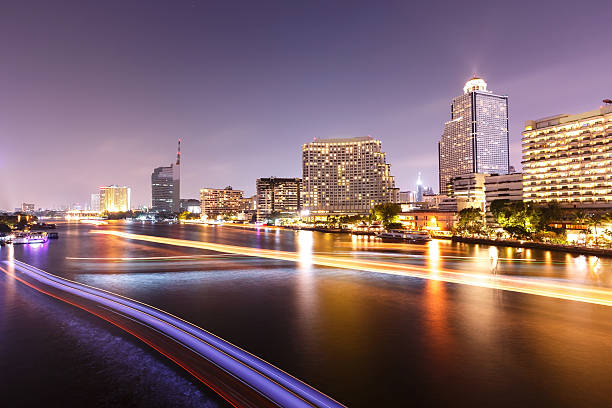 istock beautiful night city bangkok with speed light on river 485411053
