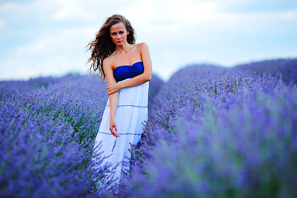 istock Woman standing on a lavender field 485413475