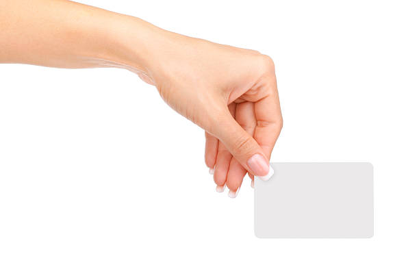 istock Female hand with a blank card. 485413926