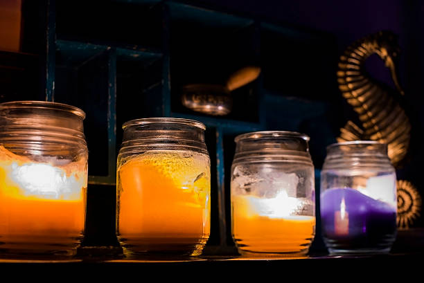 istock Candles In Front Of Oriental Shelf 485417856