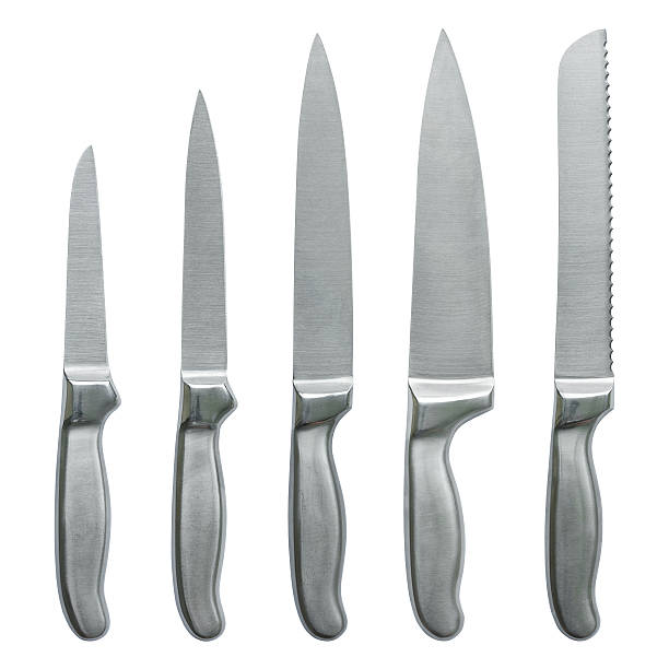 set of kitchen knifes isolated on white set of kitchen knifes isolated on white with clipping path serrated stock pictures, royalty-free photos & images